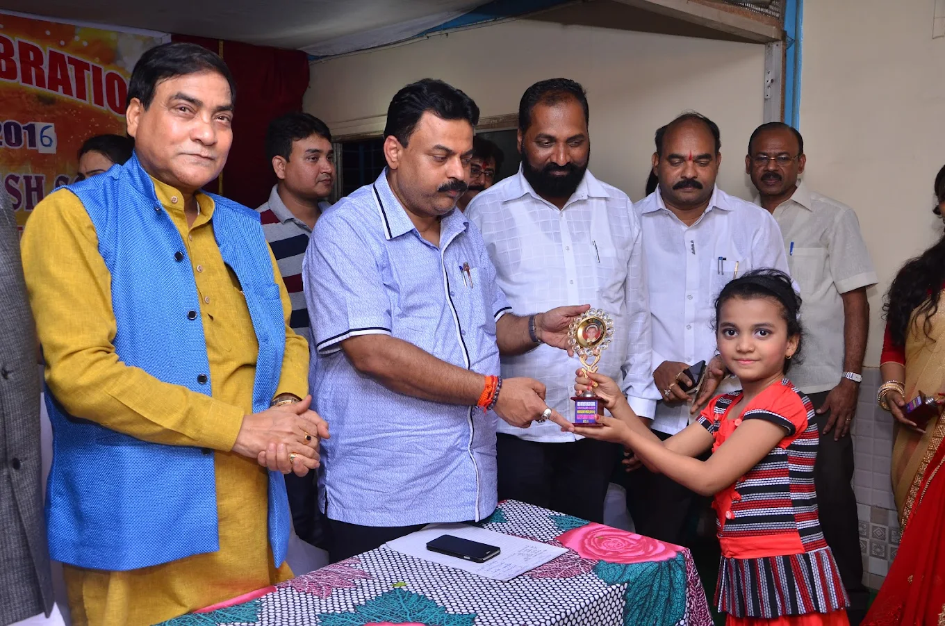Student receiving trophy
